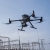 Dron DJI Matrice 350 RTK w locie nad stacją elektroenergetyczną