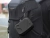 Torba, etui Sunnylife do kamer DJI Action 3-4-5 Pro - zamocowana na plecaku.webp