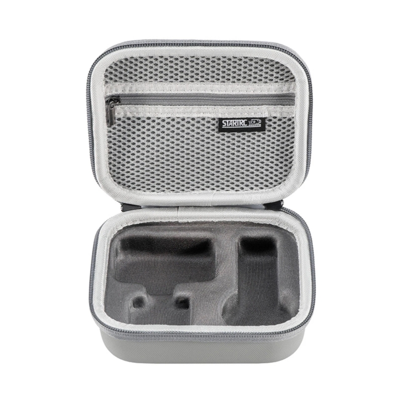 Torba z karabińczykiem umożliwiająca przypięcie do plecaka lub paska.