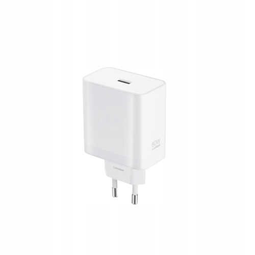 Wyeksponowane żeńskie pomarańczowe gniazdo ładujące wtyku USB-A w białej obudowie zasilacza.