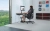 Grafitowe krzesło ergonomiczne LiberNovo Omni GEN 45 cm podczas pracy przy nowoczesnym stanowisku komputerowym
