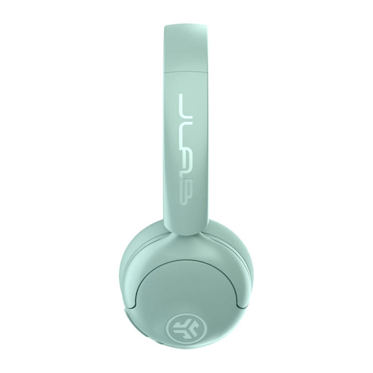 Miętowe słuchawki JLab Studio 2 Wireless z boku, logo na pałąku