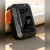 Kompresor CYCLAMI MAX160 przy desce SUP na plaży