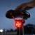 Lampka CYCLAMI CY180 nocą pod siodełkiem