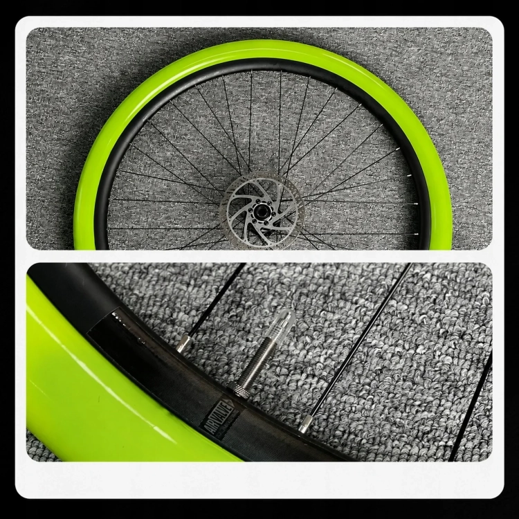 Dętka CYCLAMI MTB 65G w kole i wentyl w obręczy