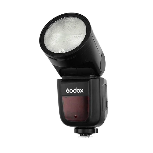 Lampa błyskowa Godox V1 do Nikona z przodu pod kątem, okrągła głowica