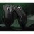 Dwie czarne myszy Attack Shark V3 na zielonym tle