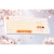 Attack Shark X87 Ultra Iced Orange na biurku