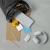 Biała mysz Logitech Pebble Mouse 2 M350s wysuwana z torby