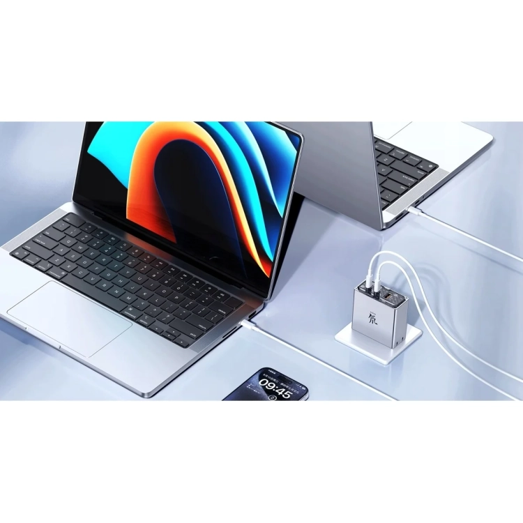 Ładowarka REDMAGIC DAO 100 W ładuje laptopa i telefon na biurku