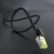 Zwinięty kabel UGREEN NW150 Cat.7 w oplocie na ciemnym tle