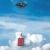System zrzutu STARTRC do DJI Avata 2 dron z zawieszonym ładunkiem w locie