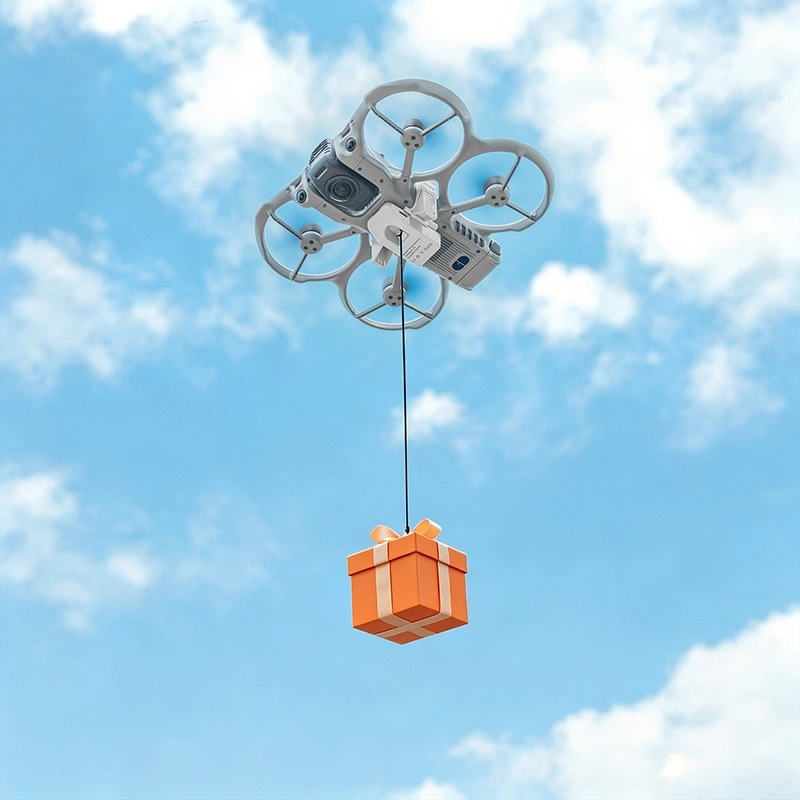 System zrzutu STARTRC zamontowany pod dronem DJI Avata 360