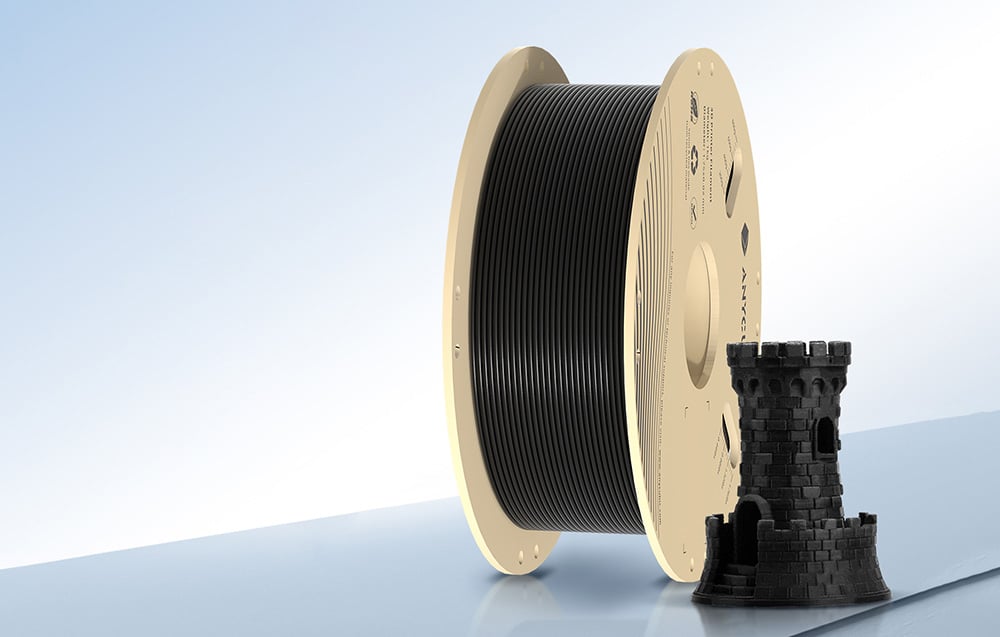 Czarny filament PLA Anycubic 1 kg oraz wydrukowana wieża testowa