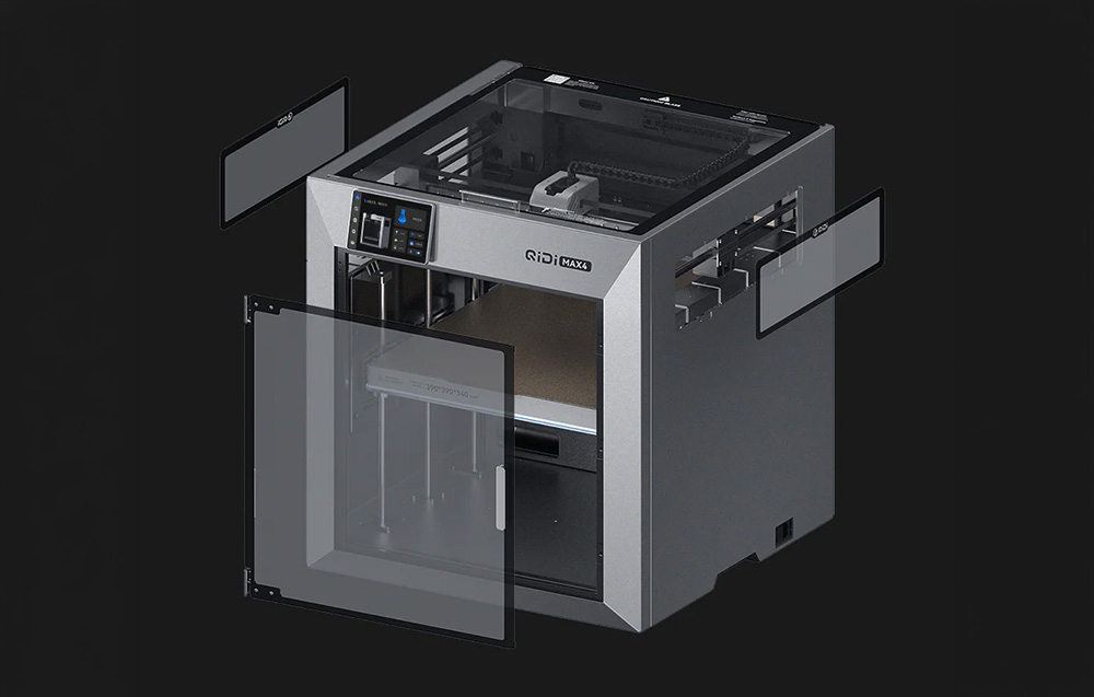 Zamknięta drukarka 3D QIDI Max 4 Combo z przezroczystą obudową i zewnętrznym modułem zarządzania materiałem.