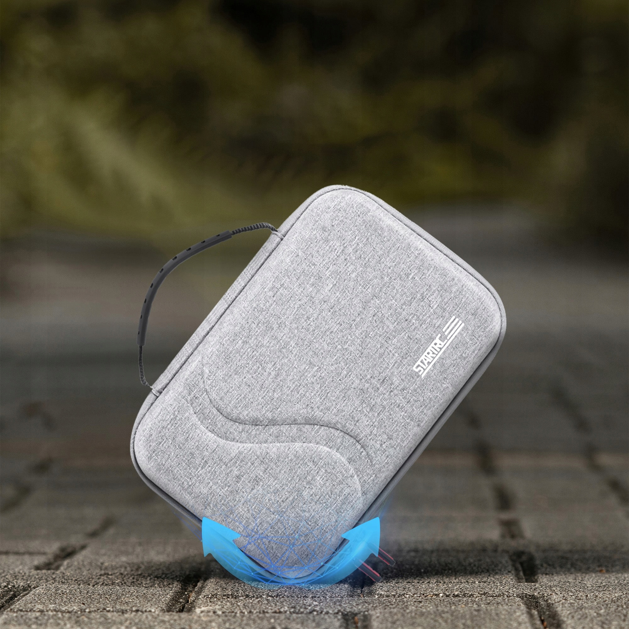 Zbliżenie na materiał i zamek błyskawiczny torby STARTRC